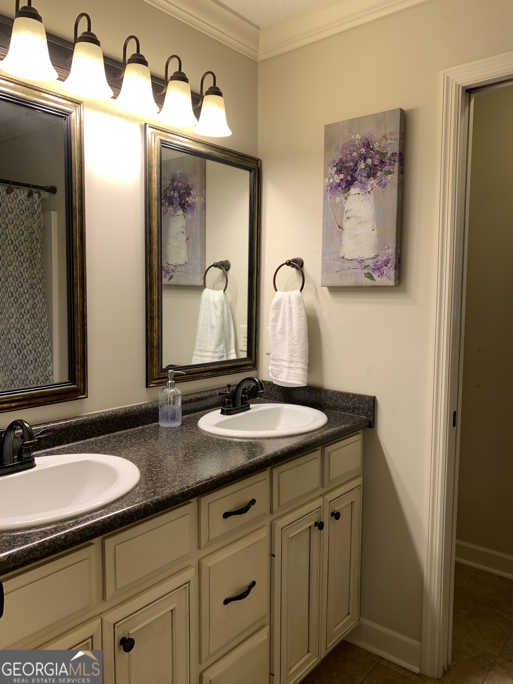 4192 Bright Creek Road Hahira, GA 31632 - Photo 20 of 28 a bathroom with a granite countertop sink and a mirror