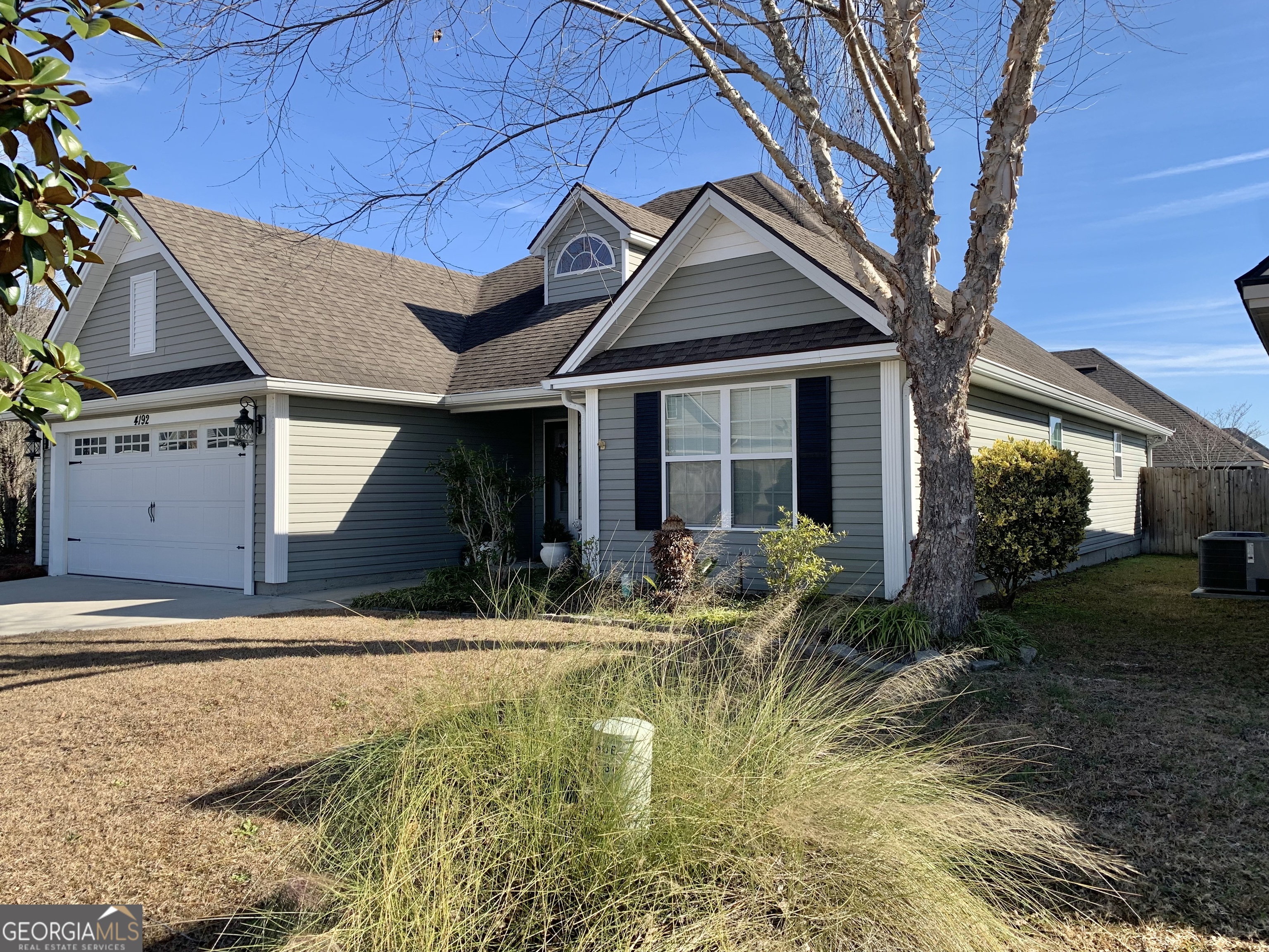 4192 Bright Creek Road Hahira, GA 31632 - Photo 2 of 28 a front view of a house with garden