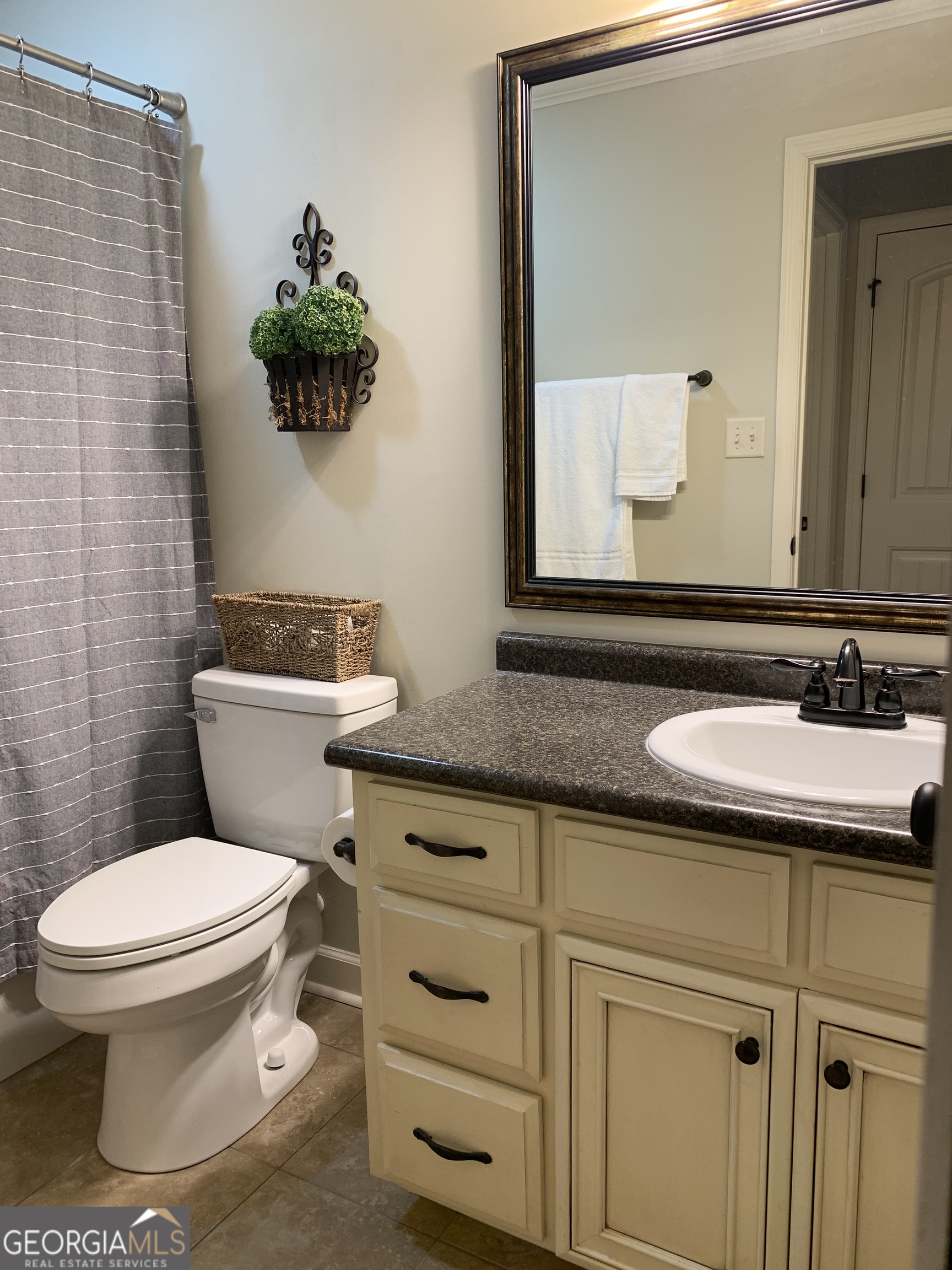 4192 Bright Creek Road Hahira, GA 31632 - Photo 23 of 28 a bathroom with a sink and a toilet