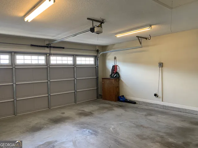 a view of a backyard with a patio