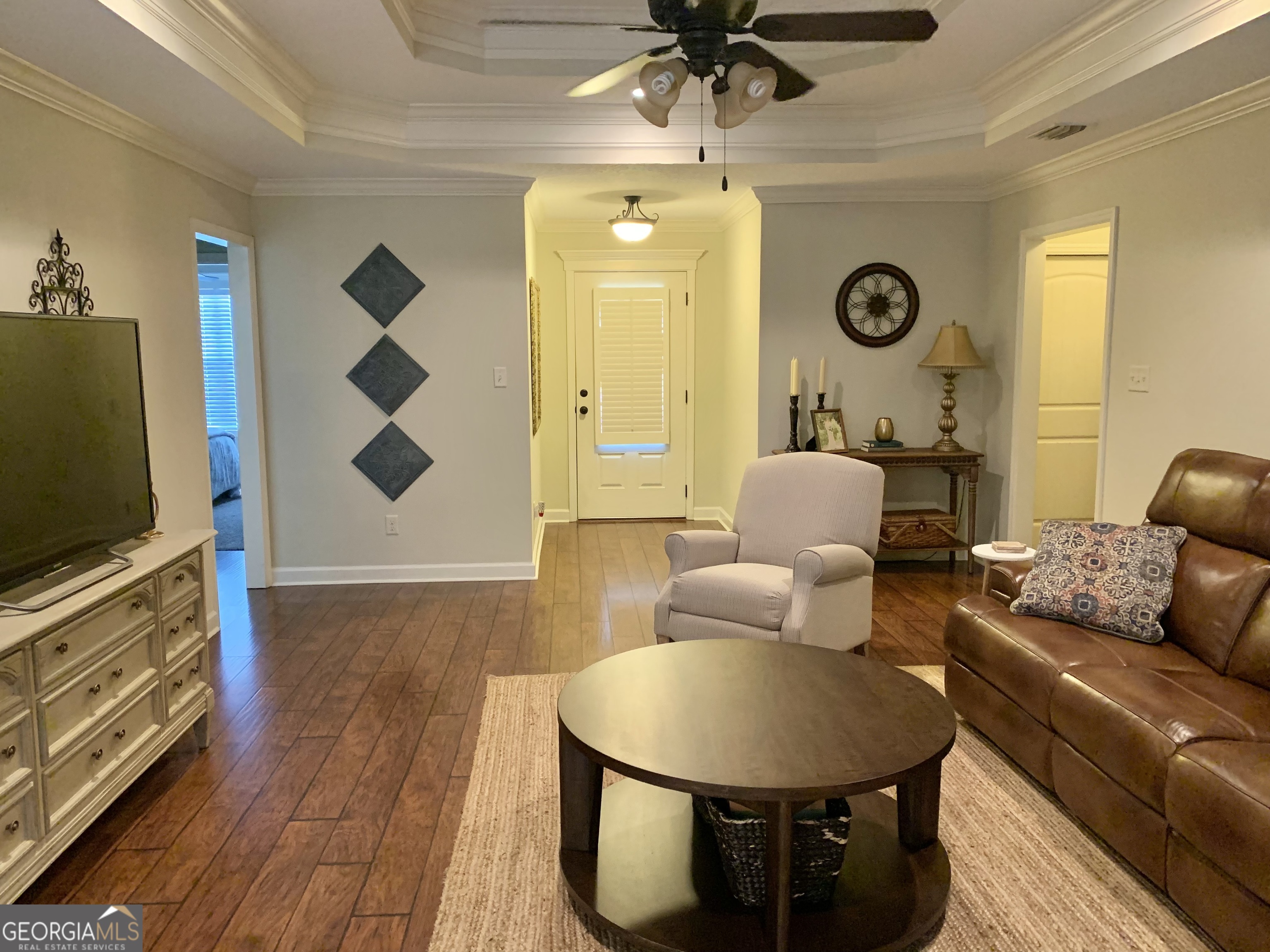 4192 Bright Creek Road Hahira, GA 31632 - Photo 8 of 28 a living room with furniture and a flat screen tv