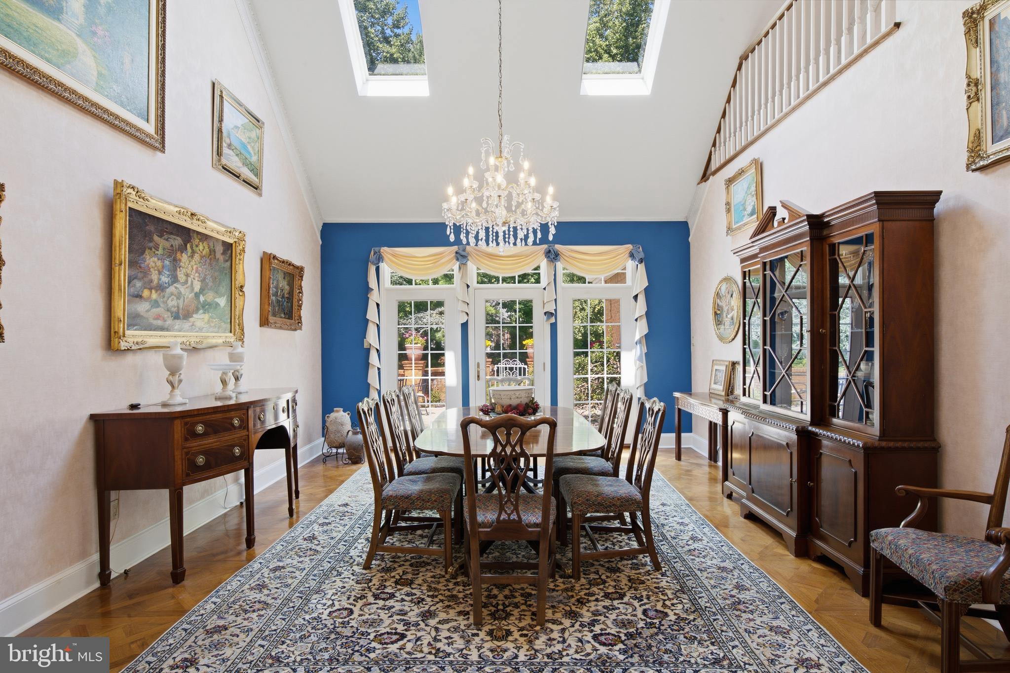 1733 Stocton Road Jenkintown, PA 19046 - Photo 32 of 149 a view of a dining room with furniture a chandelier and wooden floor