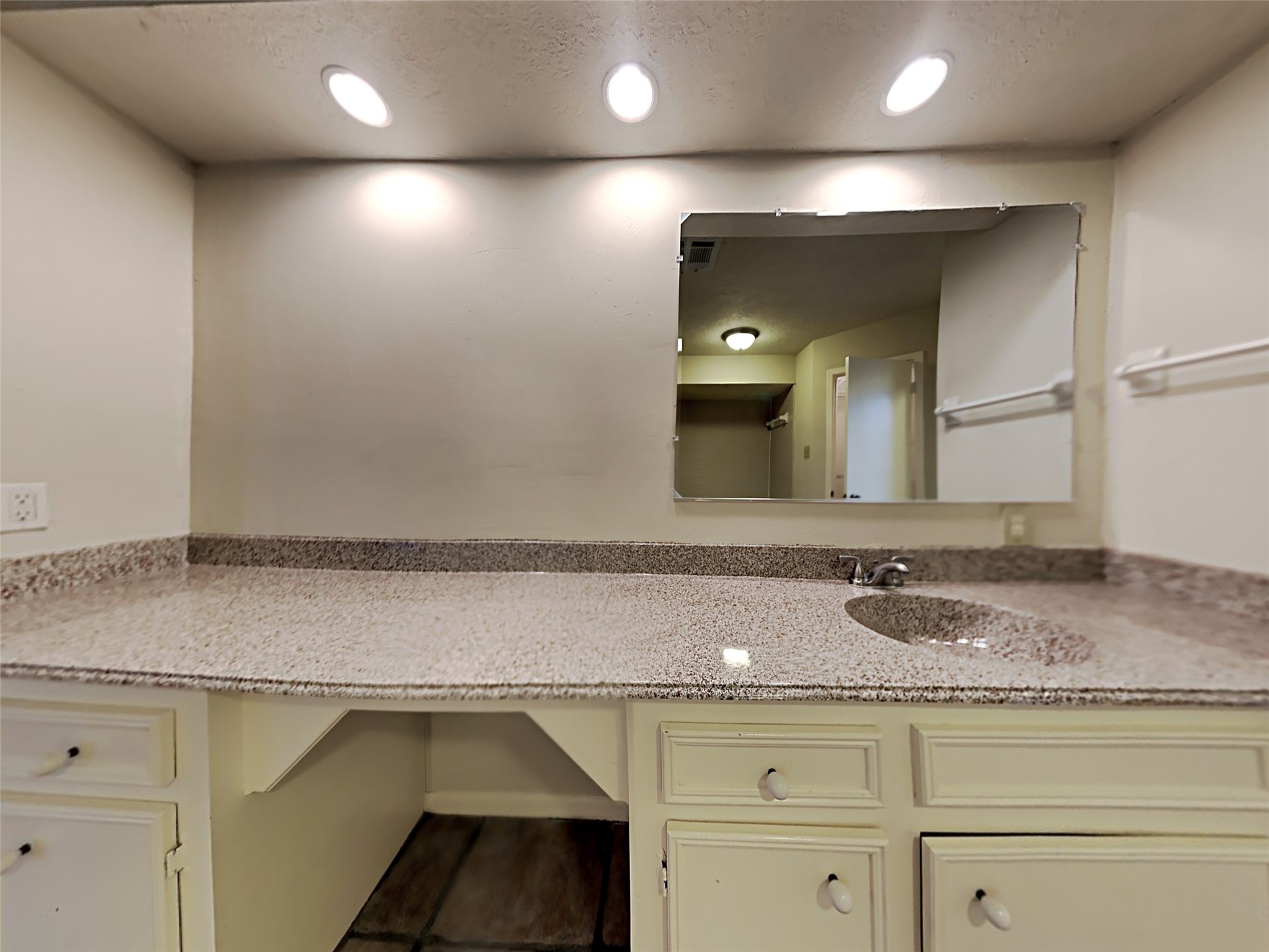 603 Blue Ridge Drive Shenandoah, TX 77381 - Photo 16 of 17 a bathroom with a sink and a mirror