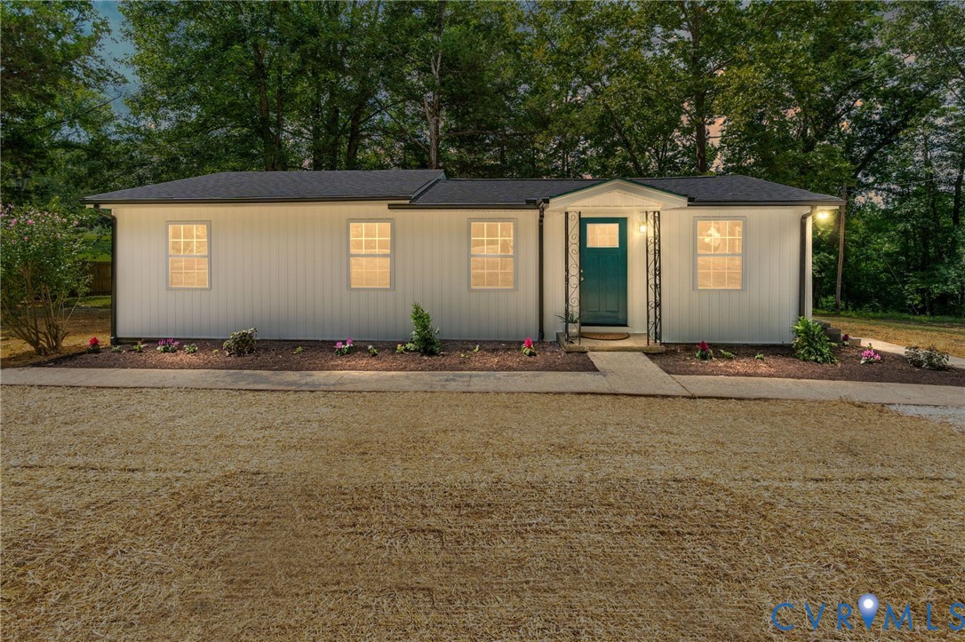 14501 Hopeful Church Road Bumpass, VA 23024 - Photo 1 of 33 a front view of a house with garden