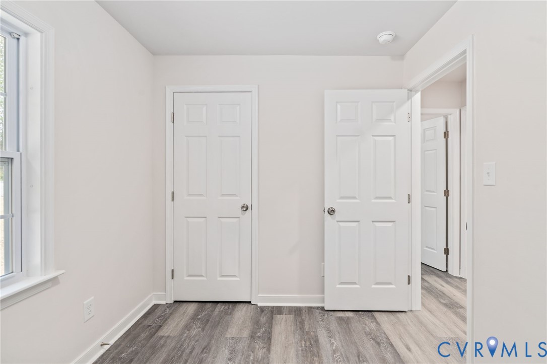 14501 Hopeful Church Road Bumpass, VA 23024 - Photo 22 of 33 a view of room with hardwood floor