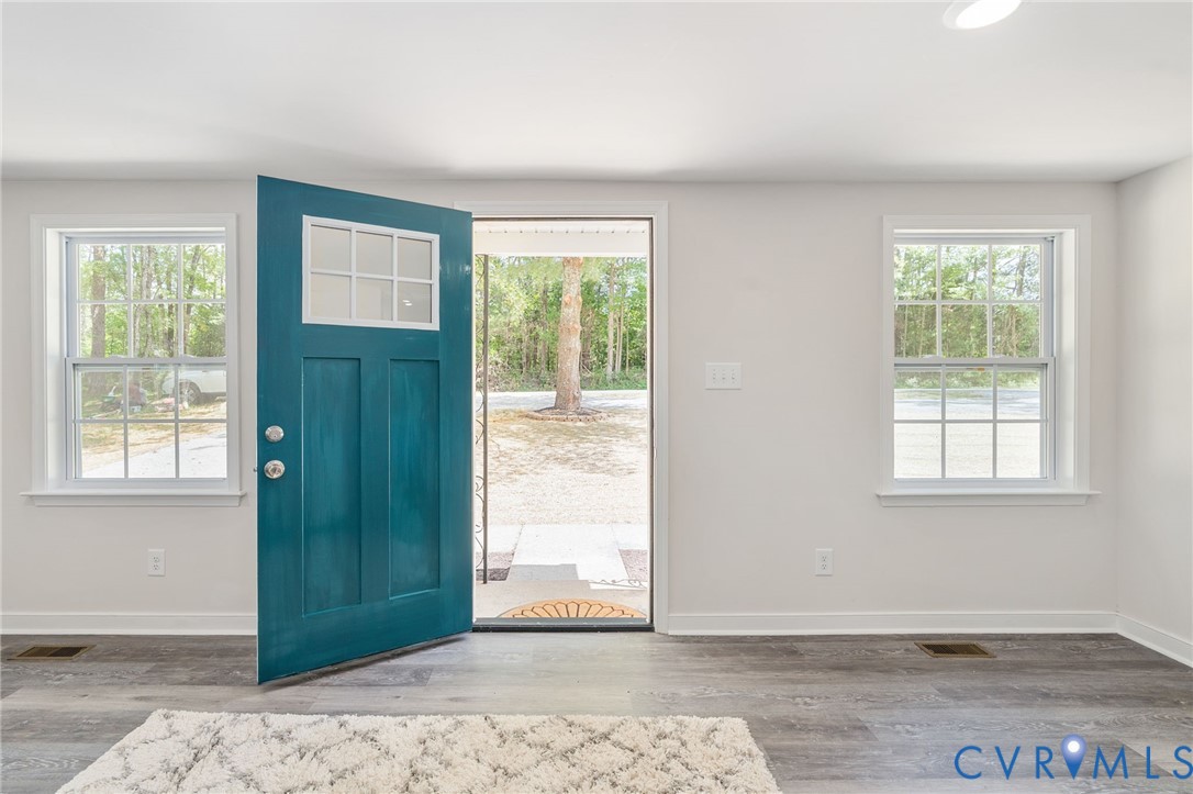 14501 Hopeful Church Road Bumpass, VA 23024 - Photo 7 of 33 an empty room with windows
