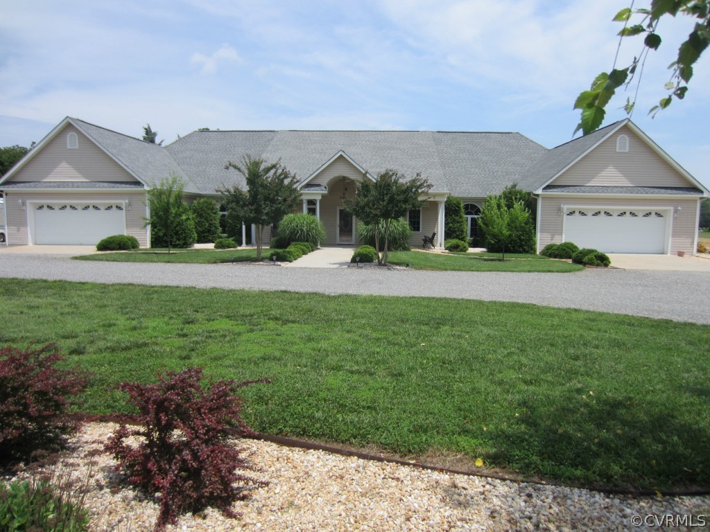600 Three Chopt Road Manakin-Sabot, VA 23103 - Photo 1 of 24 a view of a house with a yard and a garden