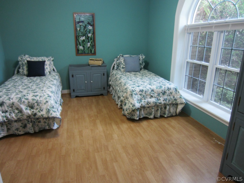 600 Three Chopt Road Manakin-Sabot, VA 23103 - Photo 15 of 24 a bedroom with a bed and a window