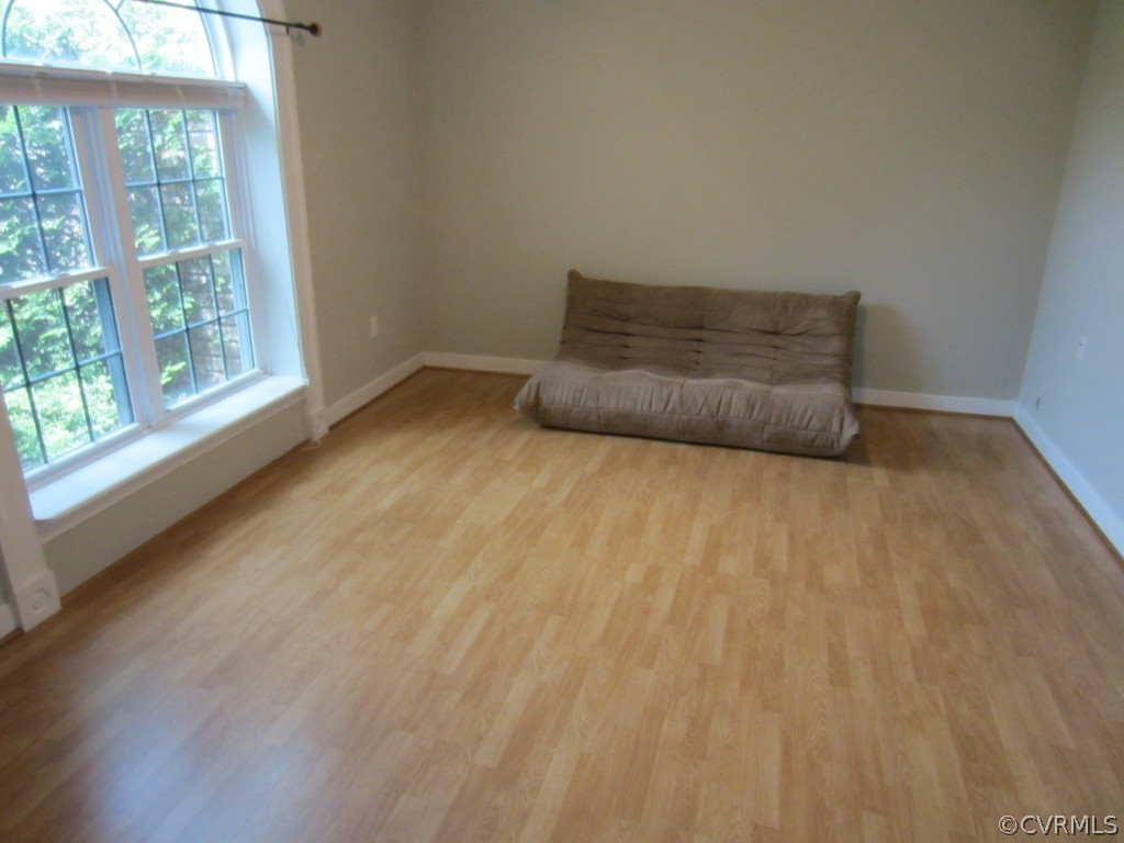 600 Three Chopt Road Manakin-Sabot, VA 23103 - Photo 16 of 24 a view of empty room with wooden floor and fan