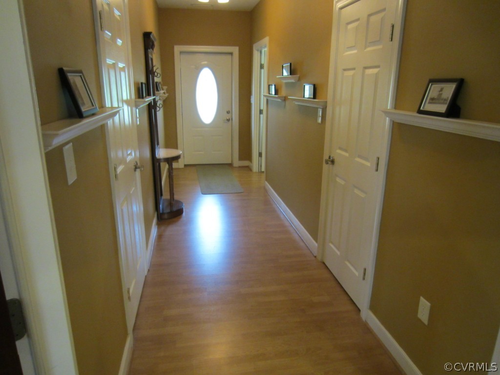 600 Three Chopt Road Manakin-Sabot, VA 23103 - Photo 7 of 24 a view of a hallway with wooden floor