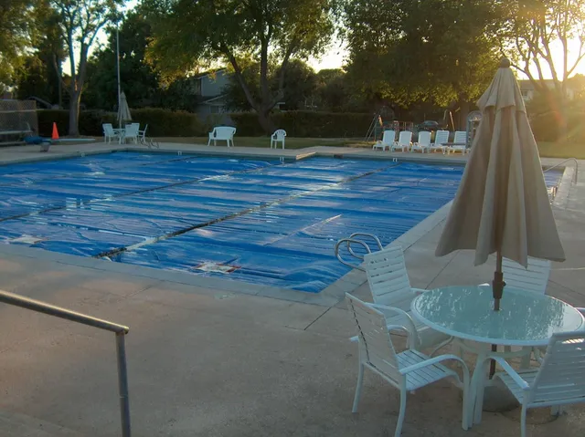a view of backyard with seating space