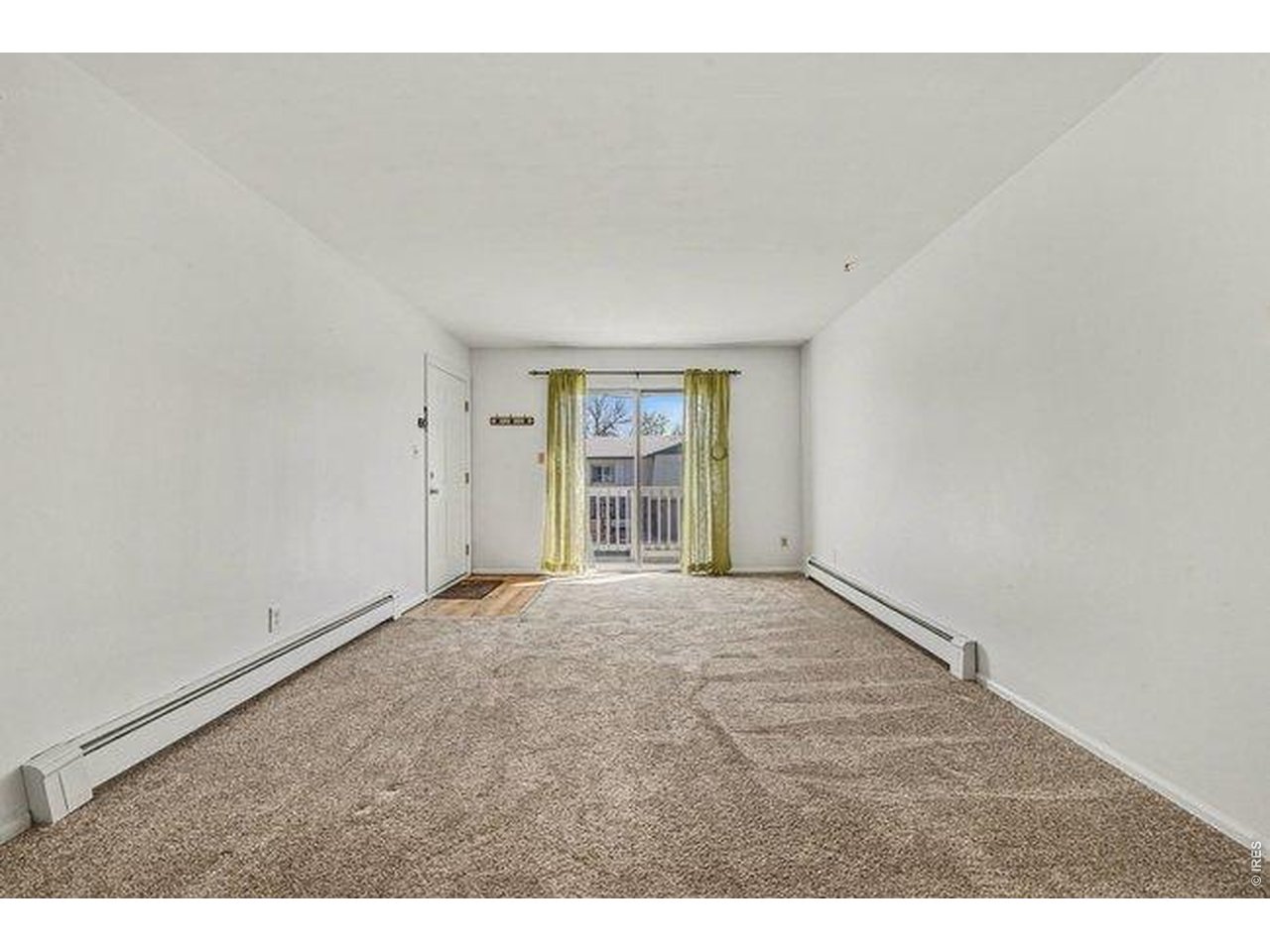 905 East Swallow Road, Unit 4 Fort Collins, CO 80525 - Photo 8 of 25 a view of an empty room with a window