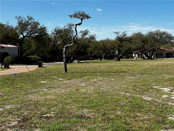 a fire hydrant in the middle of a field