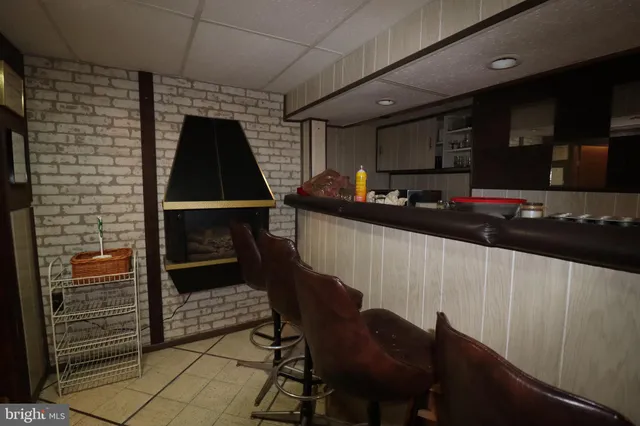 a view of a hallway with seating area