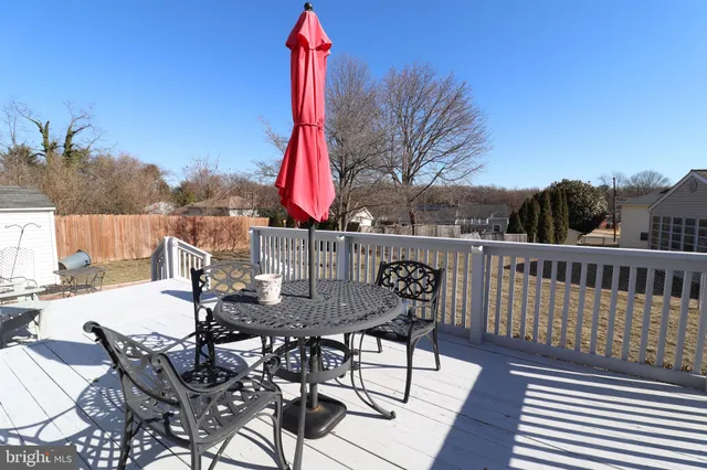 a view of a chairs and table on the terrace
