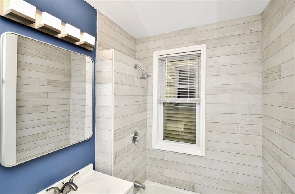 6 Coleman Street, Unit 2 Boston, MA 02125 - Photo 12 of 19 a bathroom with a window