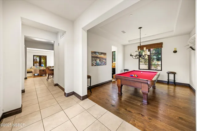 a kitchen with stainless steel appliances granite countertop a stove and a microwave