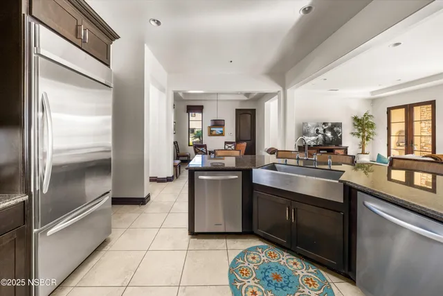 a living room with furniture or couch and a dining table