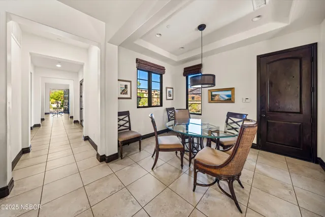 a view of a hallway with windows