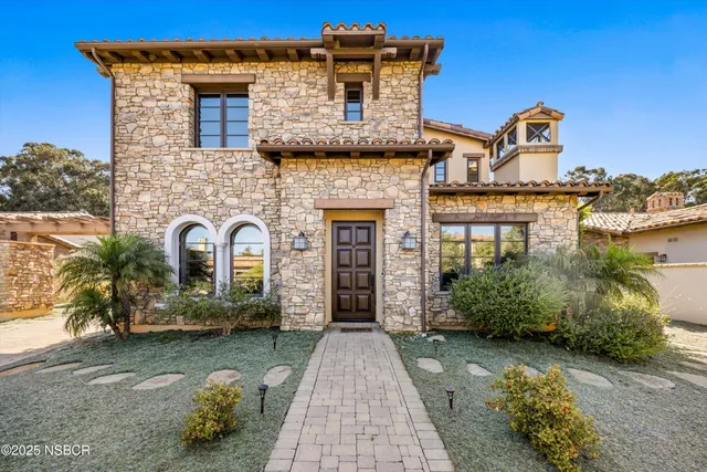 a living room with furniture and window