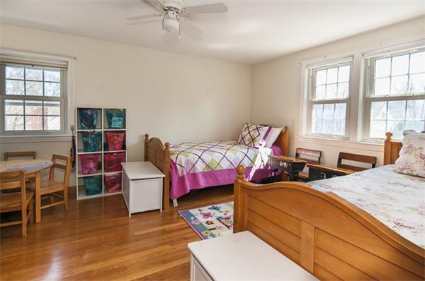 85 Rinaldo Road Weymouth, MA 02191 - Photo 10 of 13 a bedroom with furniture and a wooden floor