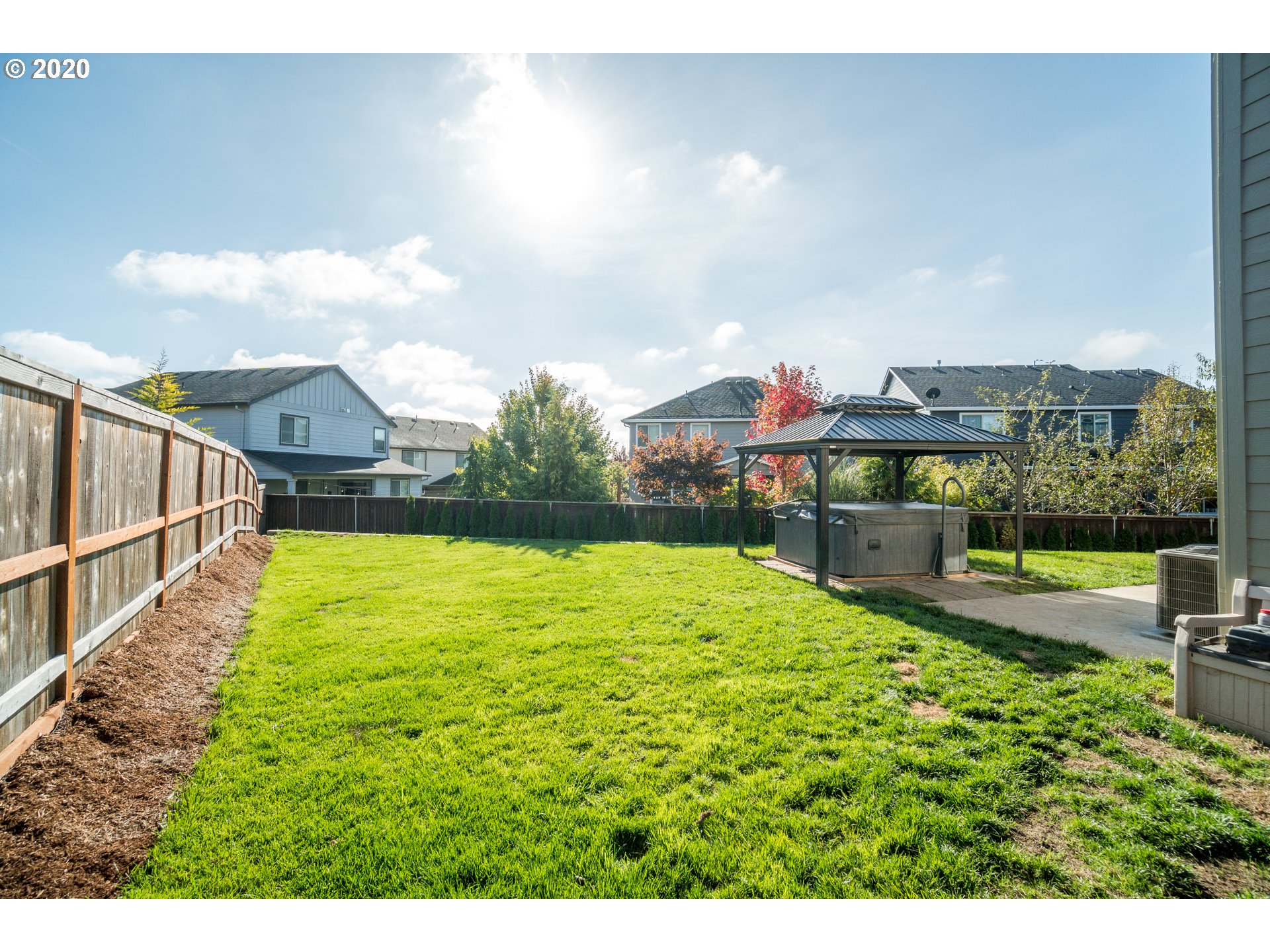 818 North Gibert Court Ridgefield, WA 98642 - Photo 23 of 30 a view of swimming pool outdoor seating and city view