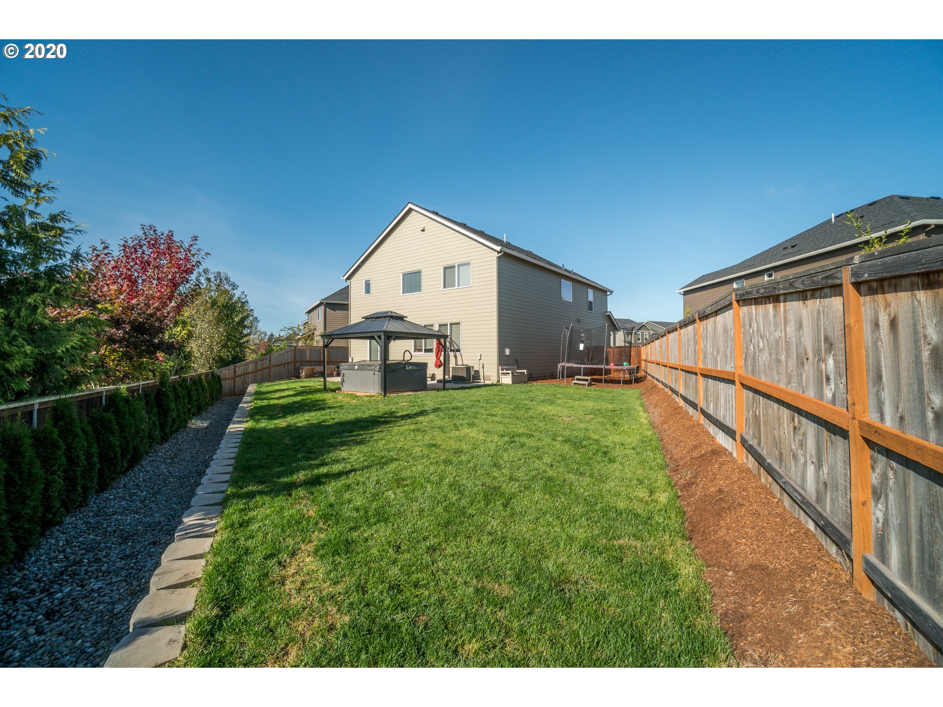 818 North Gibert Court Ridgefield, WA 98642 - Photo 24 of 30 a view of a house with a yard