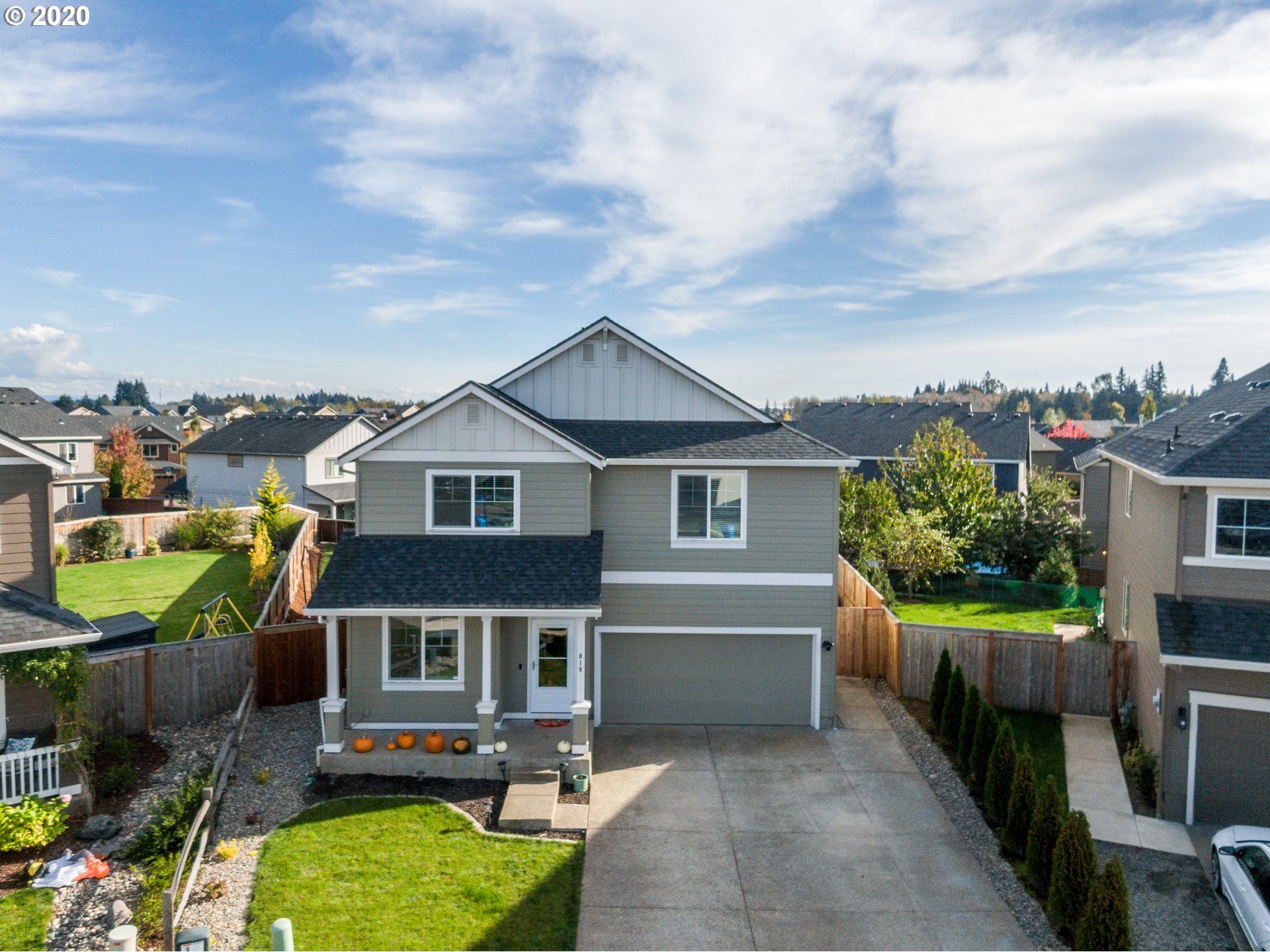 818 North Gibert Court Ridgefield, WA 98642 - Photo 29 of 30 a aerial view of a house with swimming pool and furniture