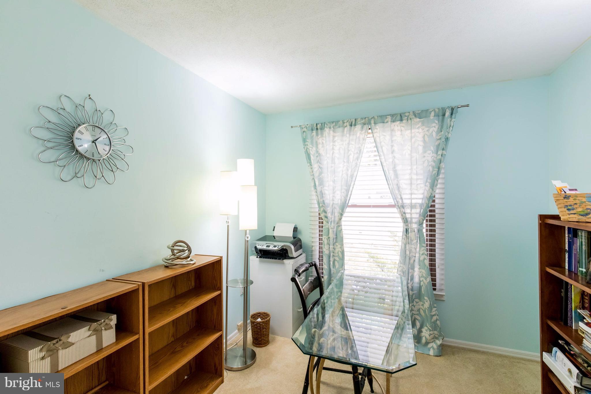 12255 Turkey Wing Court Reston, VA 20191 - Photo 24 of 30 a view of a room with workspace and a window