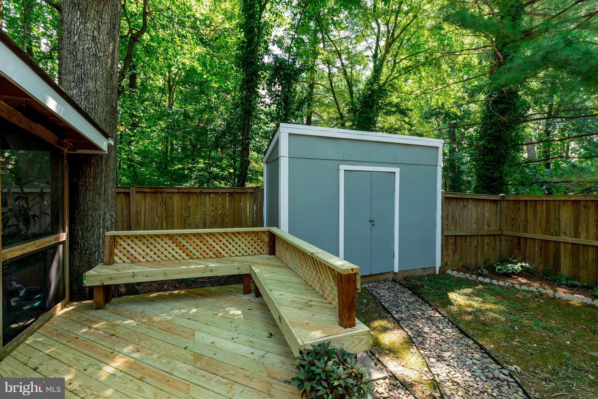 12255 Turkey Wing Court Reston, VA 20191 - Photo 26 of 30 a view of a bench in the backyard