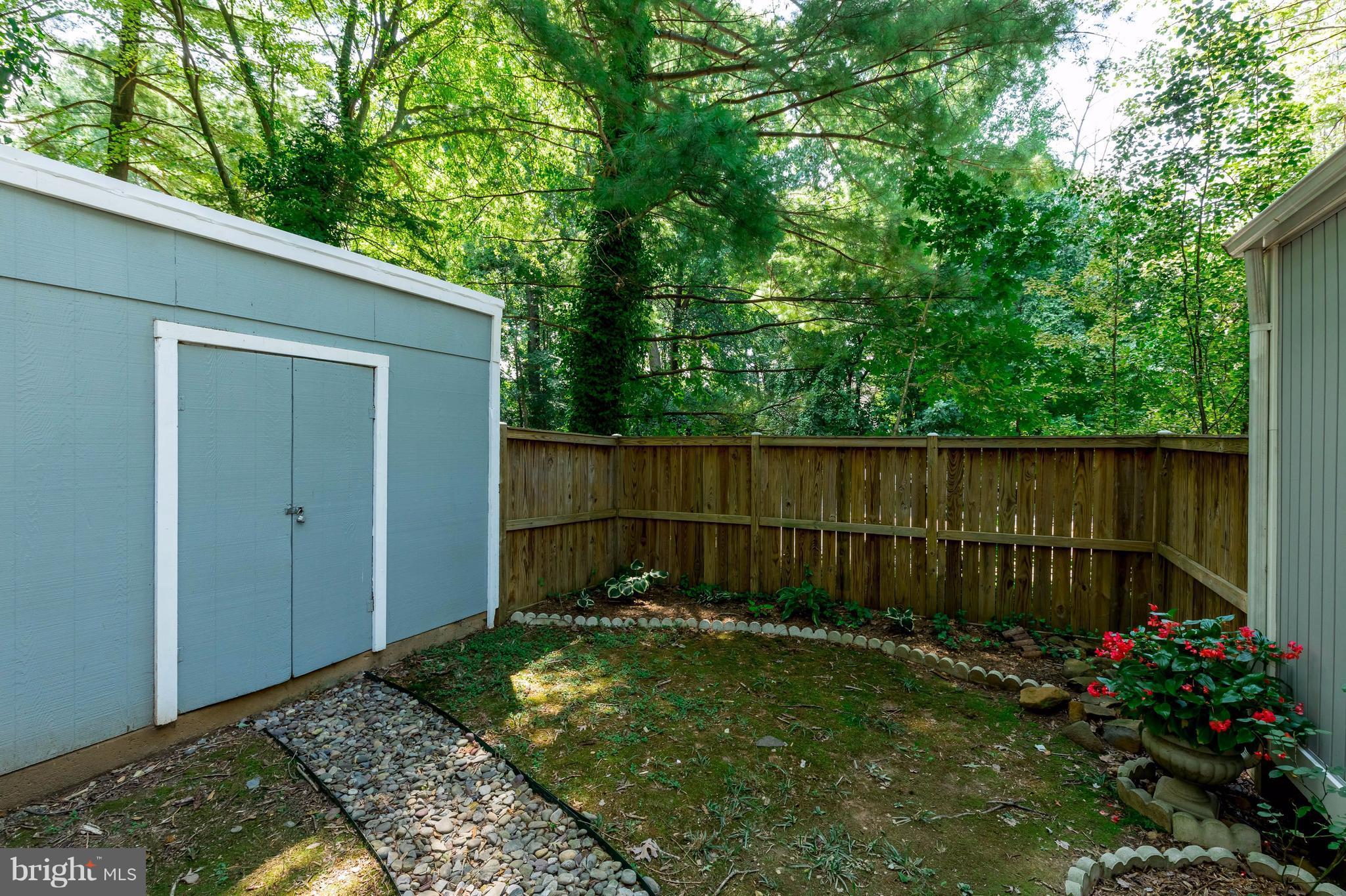 12255 Turkey Wing Court Reston, VA 20191 - Photo 27 of 30 a view of a backyard