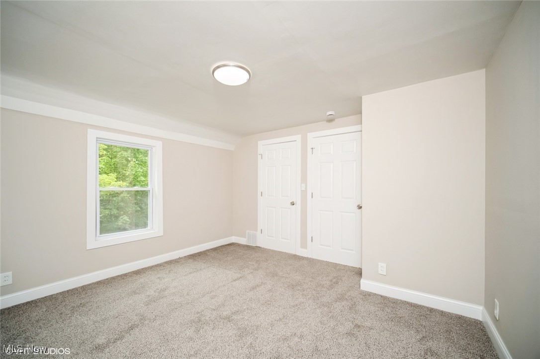 2188 North Taylor Road Cleveland Heights, OH 44112 - Photo 13 of 15 Unfurnished bedroom with baseboards and carpet floors