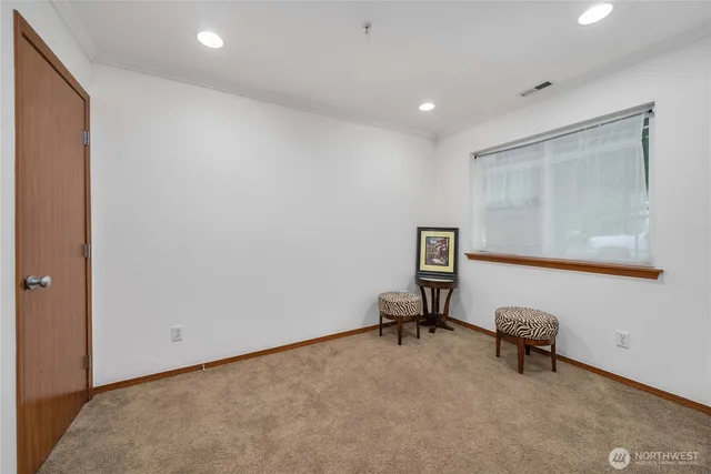 a view of a hallway with workspace