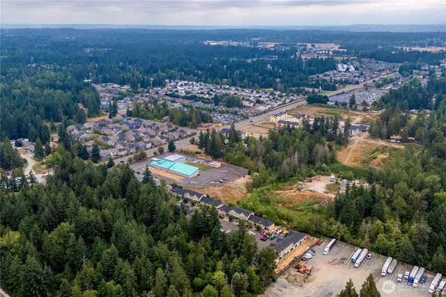 a wooden fence with some plants