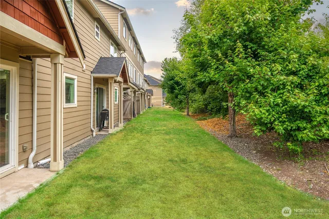 a view of a back yard of the house
