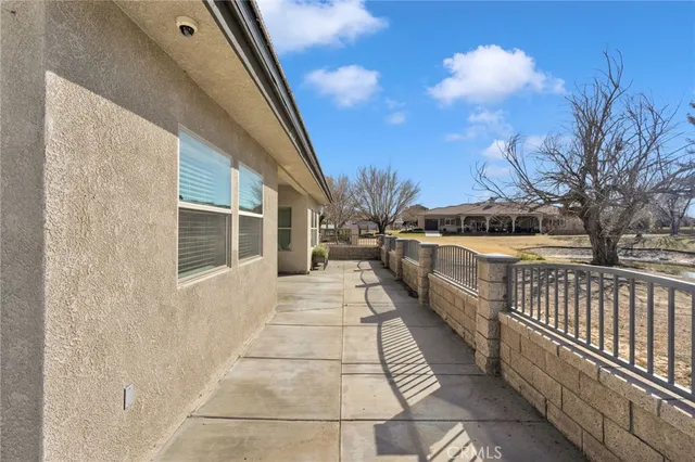 a view of a back yard of the house