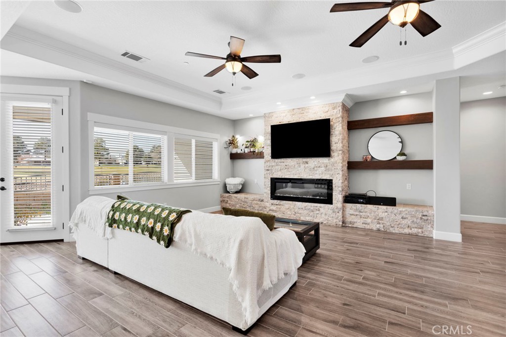 12634 Spring Valley Parkway Victorville, CA 92395 - Photo 10 of 42 a spacious bedroom with a bed and wooden floor