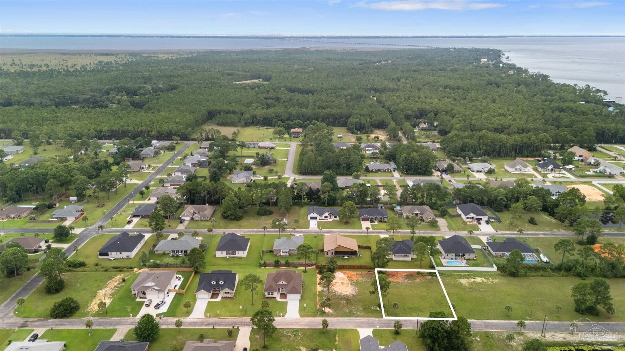 Lot 6 Farrel Way Milton, FL 32583 - Photo 4 of 4 an aerial view of residential houses with outdoor space