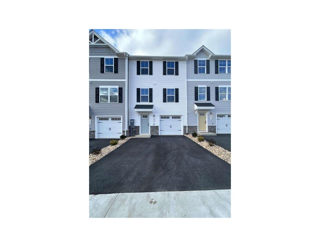 a living room with a couch and a table