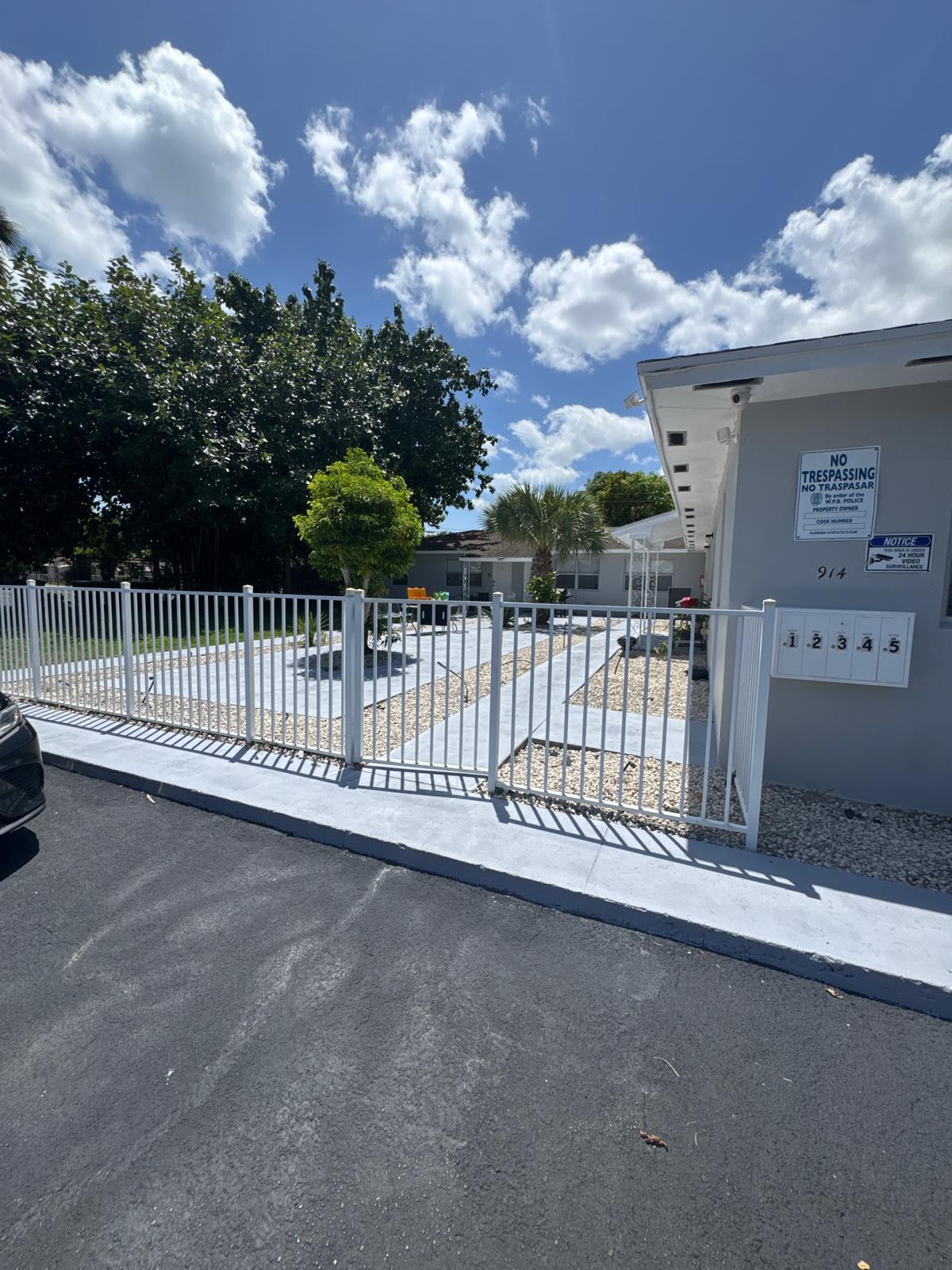 914 3rd Street, Unit 4 West Palm Beach, FL 33401 - Photo 17 of 17 a view of a wrought iron fences in front of building