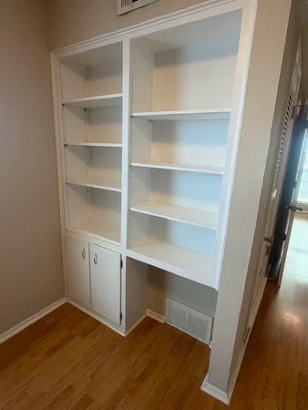 a view of an empty walk in closet