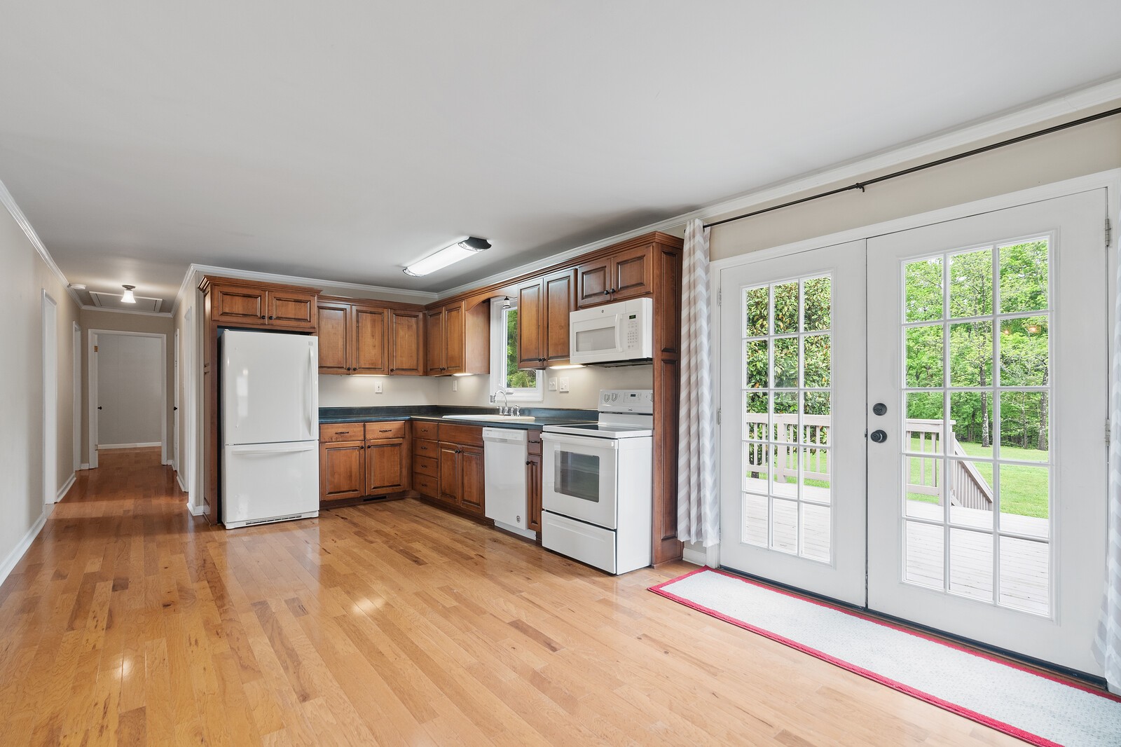 373 S Road Cottontown, TN 37048 - Photo 11 of 34 a large kitchen with stainless steel appliances granite countertop a stove and a large window