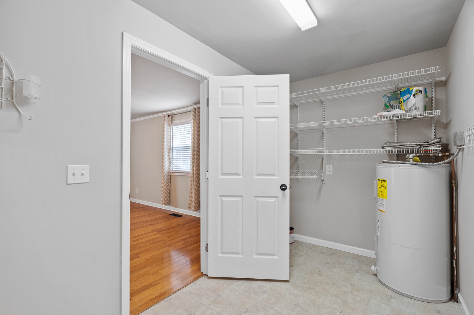 373 S Road Cottontown, TN 37048 - Photo 20 of 34 a view of walk in closet with empty racks