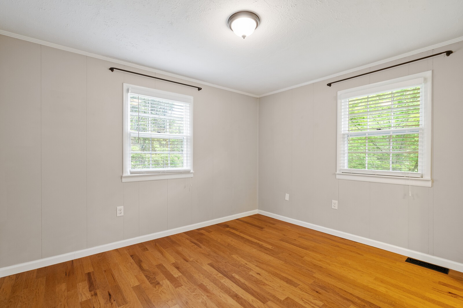 373 S Road Cottontown, TN 37048 - Photo 26 of 34 a view of an empty room with wooden floor and a window