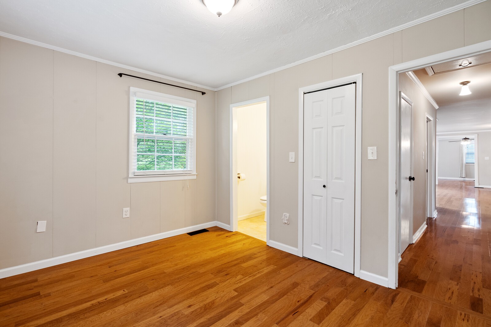 373 S Road Cottontown, TN 37048 - Photo 27 of 34 a view of empty room with wooden floor and fan