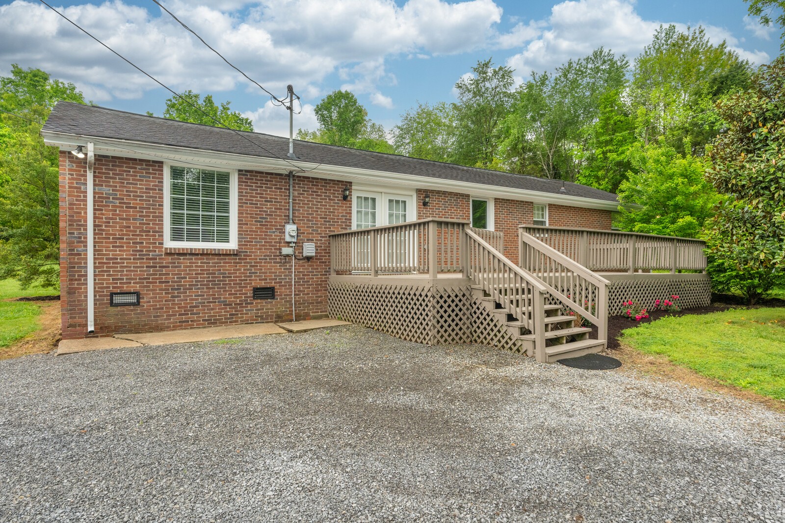 373 S Road Cottontown, TN 37048 - Photo 29 of 34 a view of a house with a yard and garage