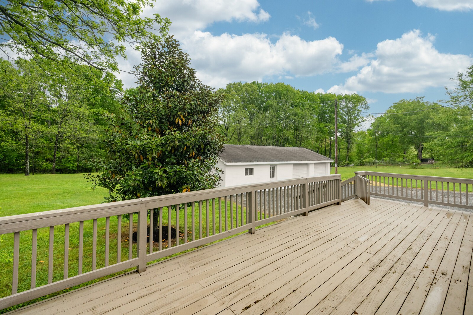 373 S Road Cottontown, TN 37048 - Photo 30 of 34 a view of balcony with deck and wooden floor
