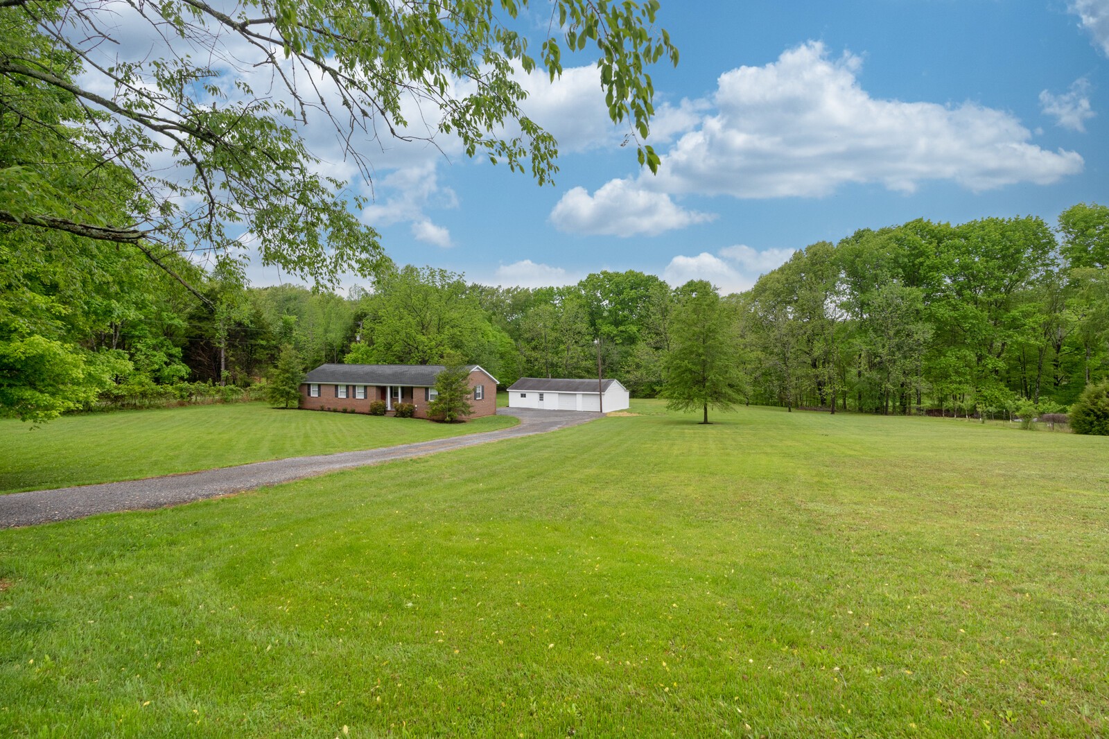 373 S Road Cottontown, TN 37048 - Photo 4 of 34 a view of a house with a yard