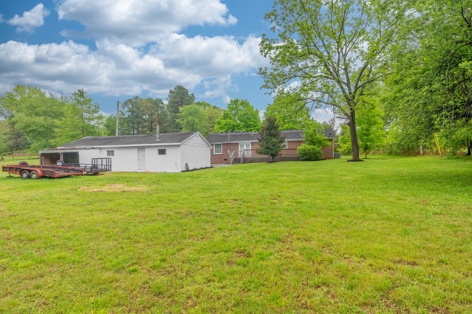 373 S Road Cottontown, TN 37048 - Photo 34 of 34 a front view of house with yard and trees in the background