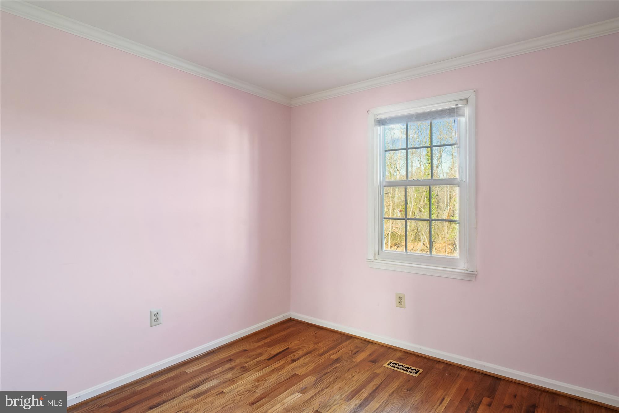 1046 Windrush Lane, Unit 38 Sandy Spring, MD 20860 - Photo 25 of 63 an empty room with a window